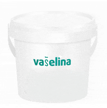 a white plastic bucket with the word vaseline on it