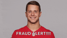 a man in a red shirt with fraud alert written on it