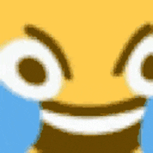 a close up of a cartoon character 's face with a smiling face and big eyes .