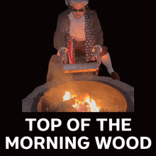 a man in a patriotic costume is standing in front of a fire pit with the words top of the morning wood below it