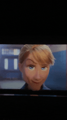 a cartoon character with blonde hair and blue eyes looks at the camera