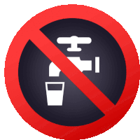 a no drinking sign has a faucet and a cup in it