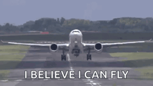 an airplane is taking off from an airport runway with the words `` i believe i can fly '' written below it .
