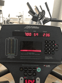 a life fitness treadmill displays the number 700 on the screen