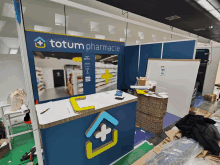 a totum pharmacie is being built in a store