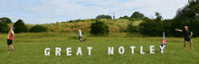 a sign that says great notley on it in a field