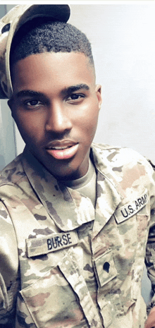 a man in a us army uniform has the name burse on his chest