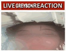 a close up of a woman 's face with a red sign that says live greyson reaction