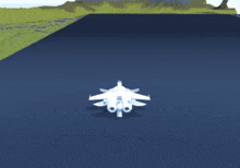 a white jet is sitting on top of a large body of water