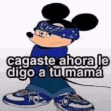 mickey mouse is wearing a bandana and sunglasses and says `` cagaste ahora le digo a tumama '' .