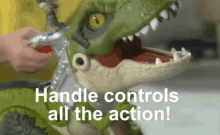 a toy dinosaur that says handle controls all the action on it