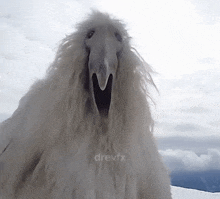 a large white animal with a mouth open and the word drevfx on the bottom right