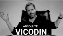 a black and white photo of a man with the name absolute vicodin
