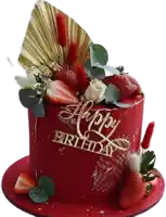 a red birthday cake with strawberries and flowers and a happy birthday sign