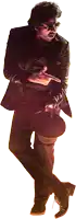 a man in a suit is holding a hat and pointing at it