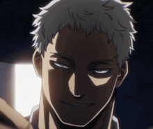 a close up of a man 's face with a shadow on his face