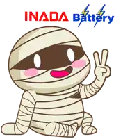 a cartoon of a mummy giving a peace sign with inada battery written in the background