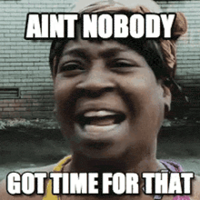 a woman with a bandana on her head is laughing and says aint nobody got time for that