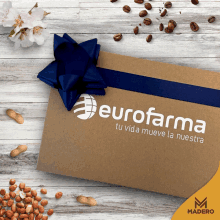 a cardboard box with a blue ribbon and eurofarma written on it