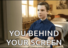 a boy sitting at a desk with the words " you behind your screen " written on the bottom