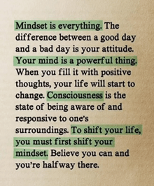 a quote about mindset is on a piece of paper