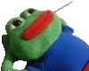 a stuffed frog with a needle sticking out of its mouth is wearing a blue shirt and red pants .