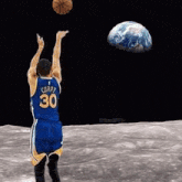 a basketball player with the number 30 on his jersey throws a basketball
