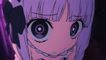 a close up of a girl with big eyes