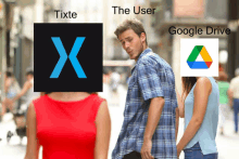 a man standing next to two women with a google drive logo