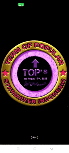 a logo for top 's starmaker indonesia is displayed on a phone screen