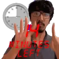 a man with glasses holds up his hands in front of a clock that says 4 minutes left