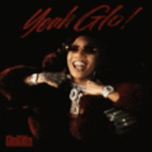 a woman wearing sunglasses and a watch is on the cover of a cd called yeah glo !