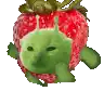 a strawberry with a green alien face on it