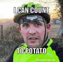 a man wearing a helmet and a yellow vest says i can count to potato memecreatorapp.com