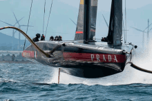 a prada sailboat is going through the ocean