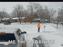 a man is standing in the snow near a mailbox with the words " me this morning " above him