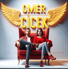 a man and a woman are sitting in a red chair under a sign that says omer cicek