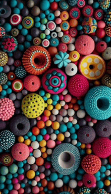 a bunch of colorful beads are lined up in a pattern