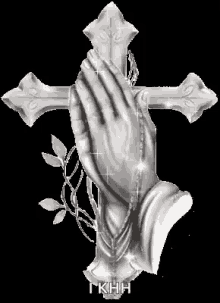 a pair of praying hands holding a cross with a rosary