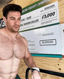 a shirtless man stands in front of a sign that says $ 3,000 on it