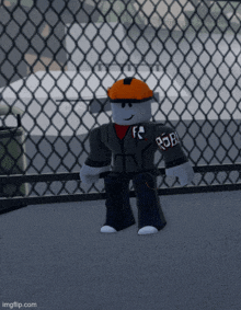 a roblox character standing in front of a chain link fence wearing a hard hat