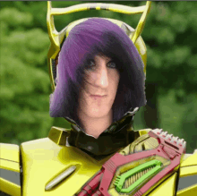 a man with purple hair is wearing a yellow robot outfit