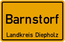 a yellow sign that says barnstorf landkreis diepholz