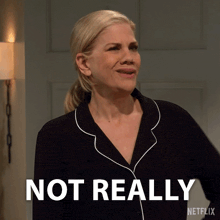 a woman in pajamas says not really in a netflix advertisement