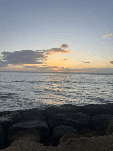 a sunset over a large body of water