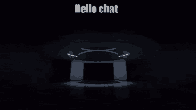 a dark room with the words hello chat written on it