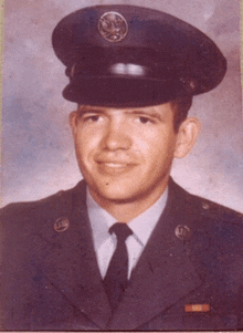 a man in a military uniform has the letters u.s. on his badge