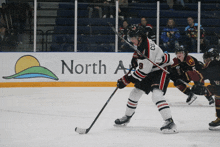 a hockey player with the number 9 on his jersey is on the ice