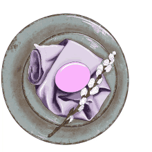 a plate with a purple napkin and an egg on it