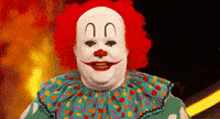 a clown with a red wig and white face